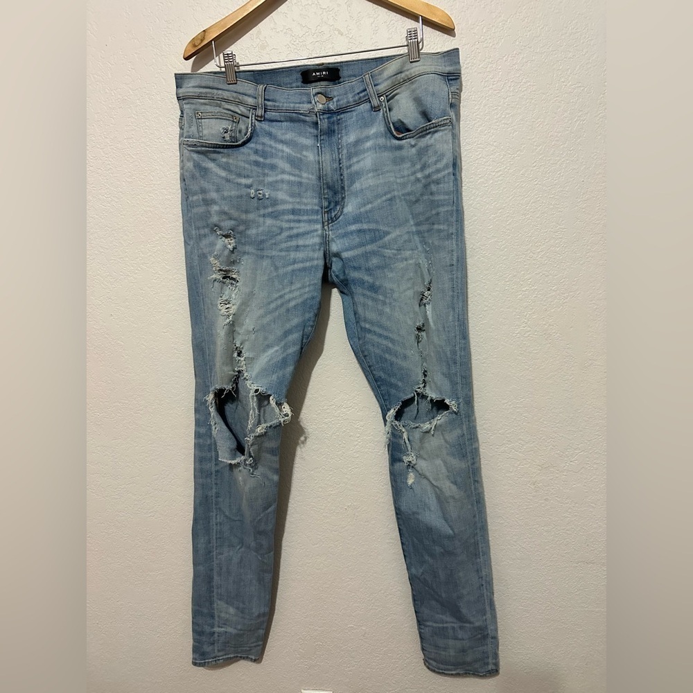 Amiri Distressed Skinny Jeans in light blue wash - Size 38